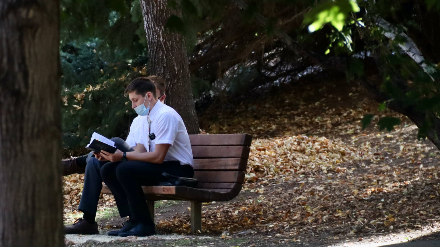 Mormon Missionaries on a Park Bench